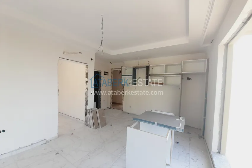 Kupuj  Oferta inwestorska: Apartament z jedną sypialnią i widokiem na góry w kompleksie premium — Alanya, Mahmutlar 2 