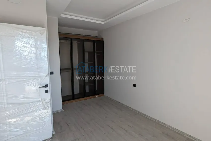 Kupuj  Apartament z jedną sypialnią z pięknym wykończeniem i widokiem na góry w dzielnicy Tomyuk, Mersin. Rata jest możliwa 8 