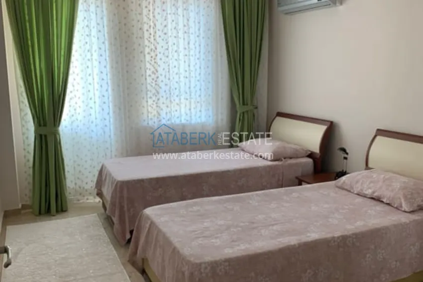 Kupuj  Mieszkanie 2+1 z nowymi meblami i widokiem na morze w kompleksie przy pierwszej plaży, Mahmutlar - dzielnica Alanya. 11 