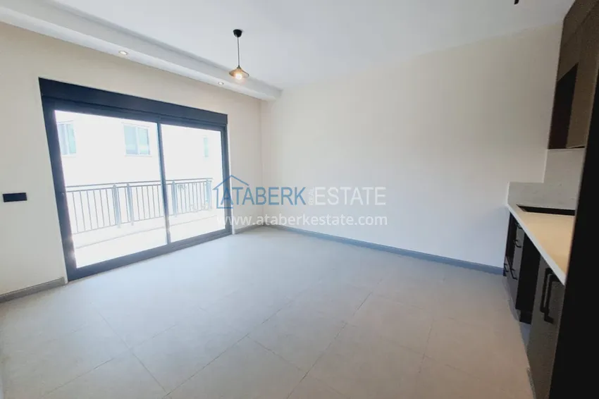Kupuj  1+1 apartament bezpośrednio od właściciela w nowym budynku 250 od morza - Centrum Alanya 1 