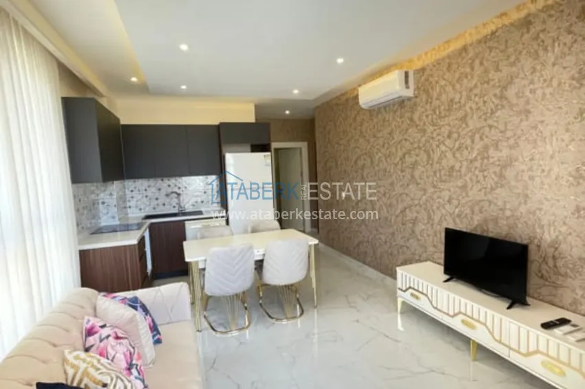 Kupuj  Apartament z jedną sypialnią pod klucz z widokiem na góry w nowoczesnym kompleksie mieszkalnym — Alanya, dzielnica Mahmutlar 2 