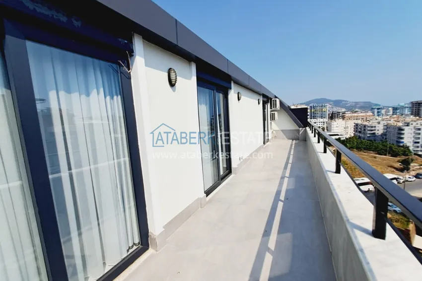 Kupuj  Umeblowany dwupoziomowy penthouse w nowoczesnym nowym kompleksie — Alanya, Mahmutlar 21 