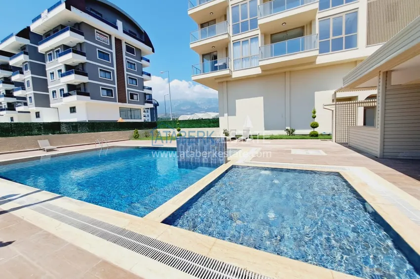 Apartament 1+1 z widokiem na góry i morze, dzielnica Kargicak w Alanyi 2 