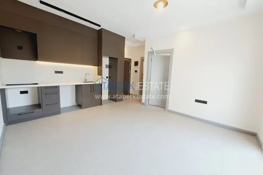 Kupuj  1+1 apartament bezpośrednio od właściciela w nowym budynku 250 od morza - Centrum Alanya 2 