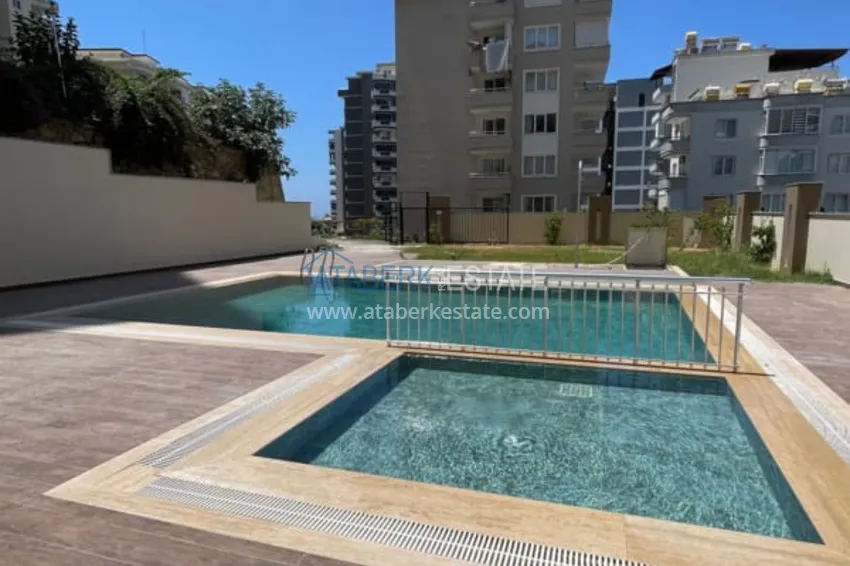 Apartament z jedną sypialnią pod klucz z widokiem na góry w nowoczesnym kompleksie mieszkalnym — Alanya, dzielnica Mahmutlar 3 