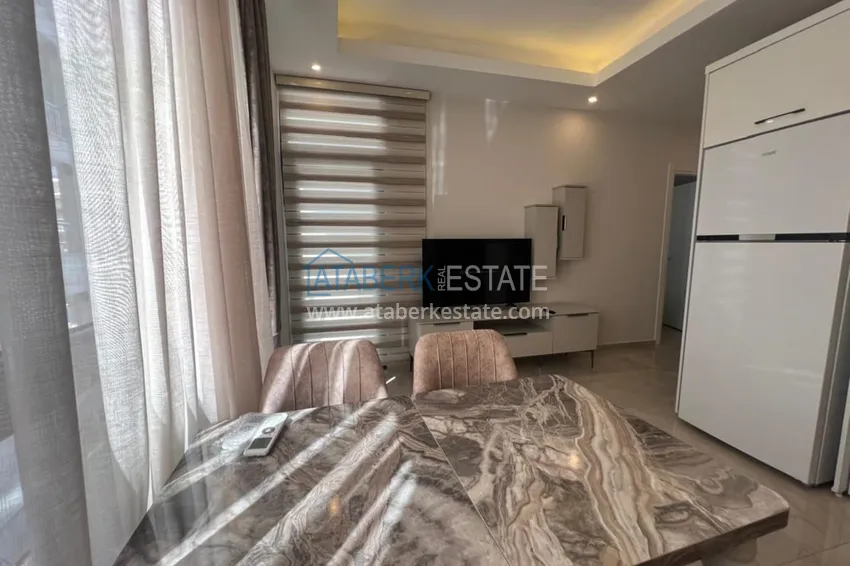 Kupuj  Umeblowane mieszkanie z jedną sypialnią do wynajęcia w centrum dzielnicy Oba, Alanya nr 8 6 