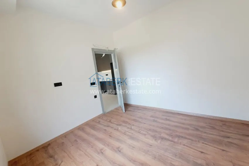 Kupuj  1+1 apartament bezpośrednio od właściciela w nowym budynku 250 od morza - Centrum Alanya 7 