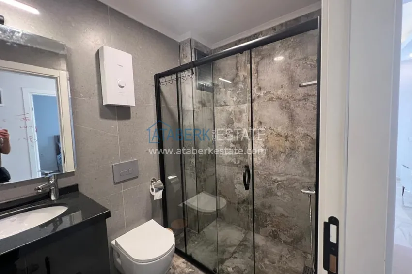Kupuj  Umeblowane mieszkanie z jedną sypialnią do wynajęcia w centrum dzielnicy Oba, Alanya nr 8 9 