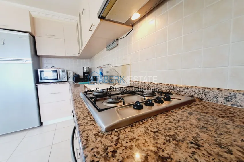 Kupuj  Dwupoziomowy apartament z meblami, oddzielną kuchnią i widokiem na morze - Alanya, dzielnica Turkler 11 