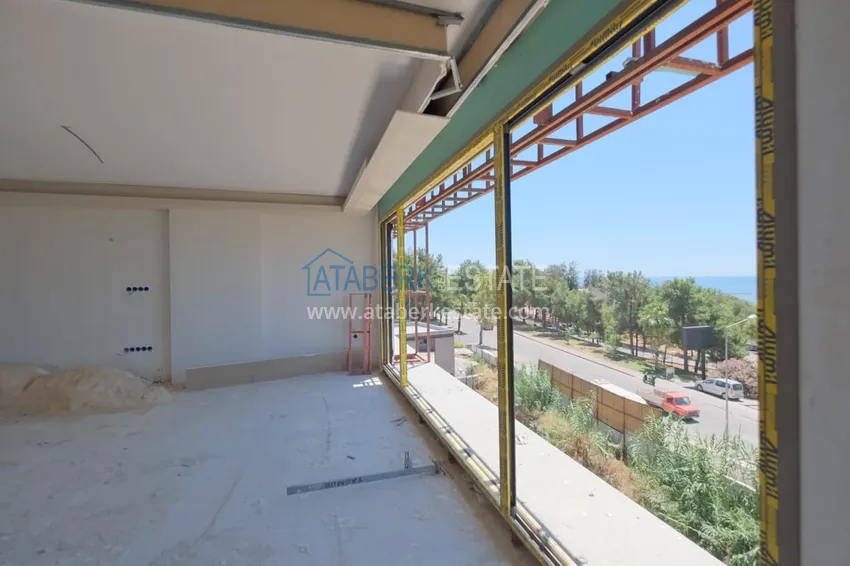 Zdjęcie -  Kompleks mieszkaniowy w budowie przy plaży w Antalya, dzielnica Lara - Guzeloba 5 