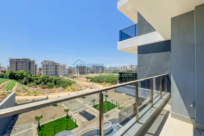 Kupuj  Gotowy apartament z jedną sypialnią w nowym kompleksie - dzielnica Mahmutlar, Alanya 10 