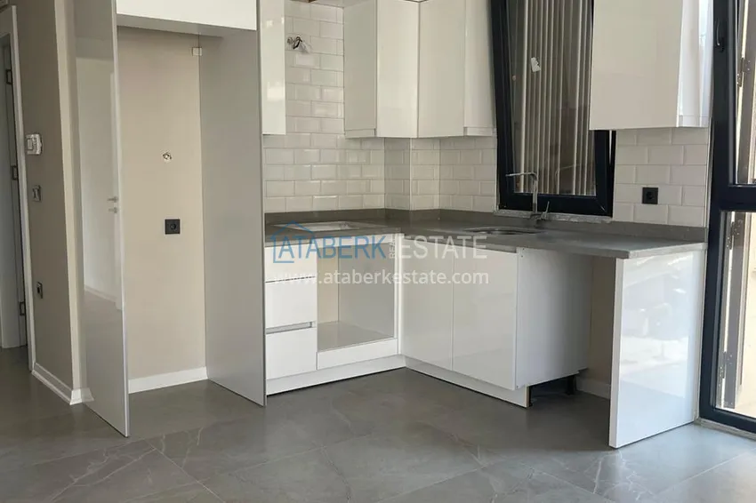 Kupuj  Apartament 1+1 w centrum Alanyi w nowym nowoczesnym kompleksie - plaża Kleopatra 11 