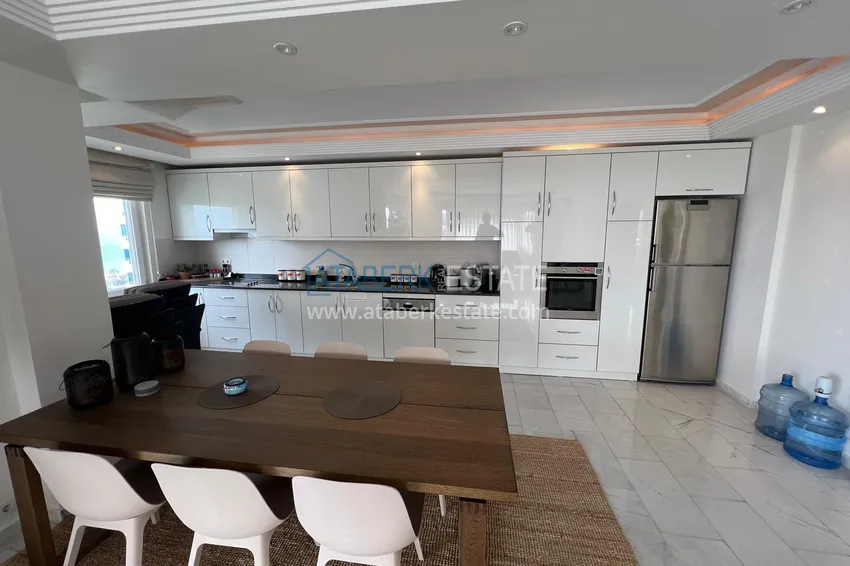 Kupuj  Apartament liniowy 3+1 z meblami, widokiem na morze i góry na plaży - Tosmur, Alanya 10 