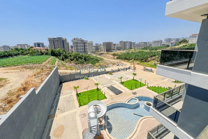 Kupuj  Gotowy apartament z jedną sypialnią w nowym kompleksie - dzielnica Mahmutlar, Alanya 11 