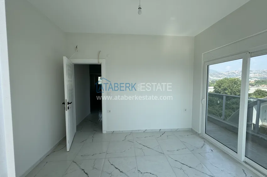 Kupuj  Duplex 2+1 z widokiem na morze i góry — dzielnica Kargicak, Alanya 11 