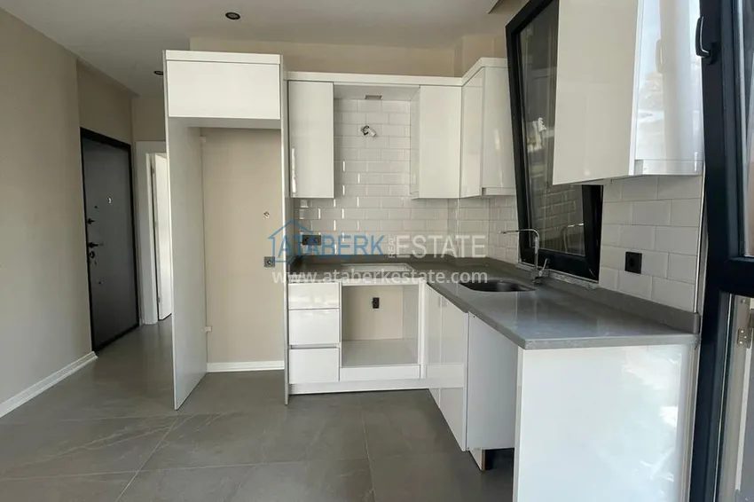 Kupuj  Apartament 1+1 w centrum Alanyi w nowym nowoczesnym kompleksie - plaża Kleopatra 12 