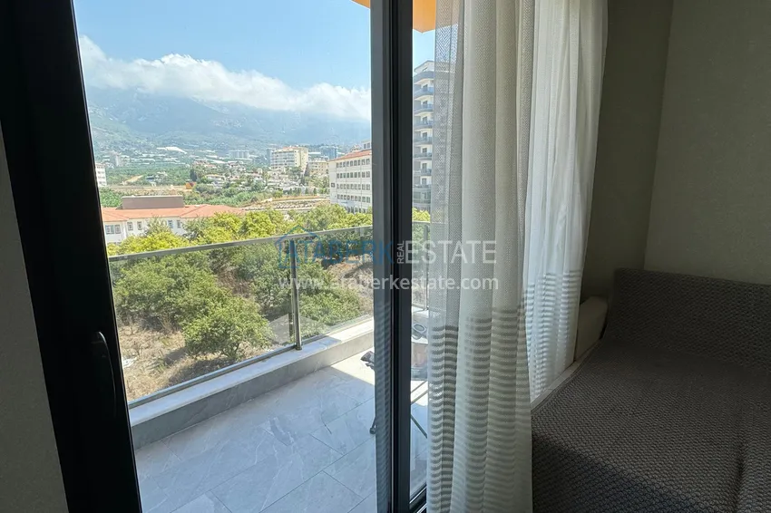Kupuj  Apartament 1+1 z nowymi meblami i widokiem na góry w nowoczesnym kompleksie - dzielnica Mahmutlar, Alanya 13 
