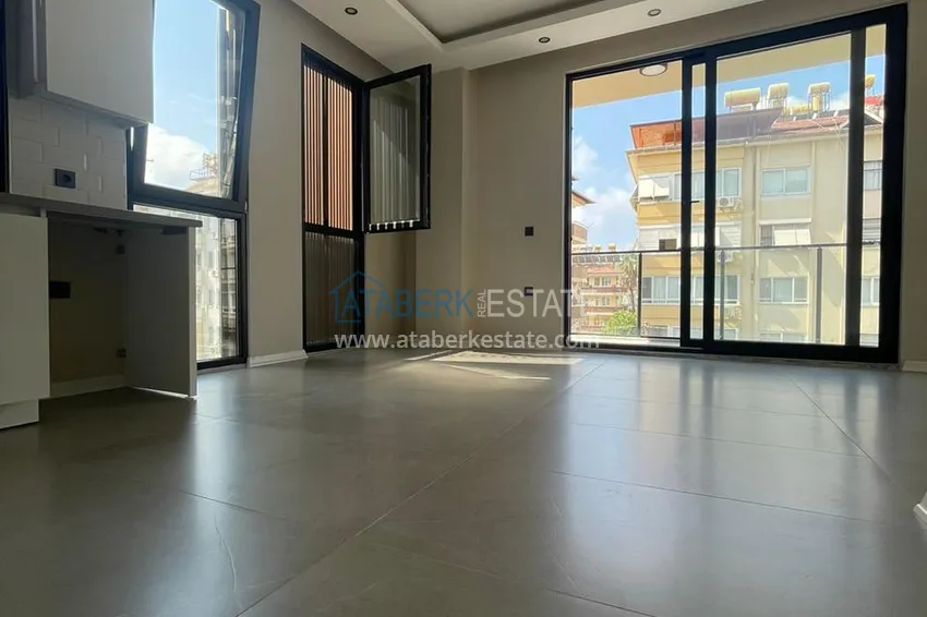 Kupuj  Apartament 1+1 w centrum Alanyi w nowym nowoczesnym kompleksie - plaża Kleopatra 16 