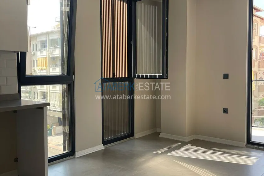Kupuj  Apartament 1+1 w centrum Alanyi w nowym nowoczesnym kompleksie - plaża Kleopatra 17 