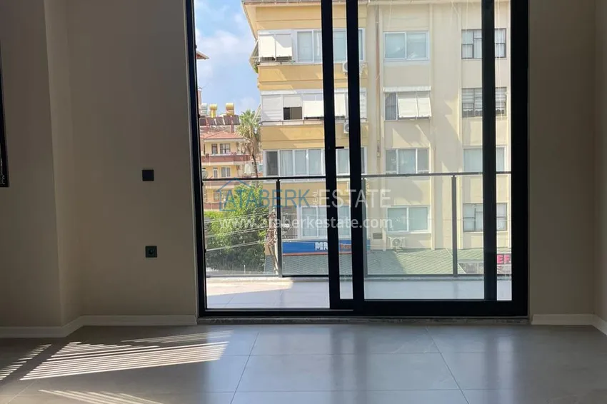 Kupuj  Apartament 1+1 w centrum Alanyi w nowym nowoczesnym kompleksie - plaża Kleopatra 23 