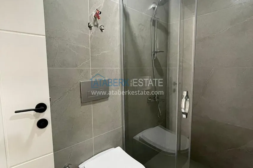 Kupuj  Apartament 1+1 w centrum Alanyi w nowym nowoczesnym kompleksie - plaża Kleopatra 32 