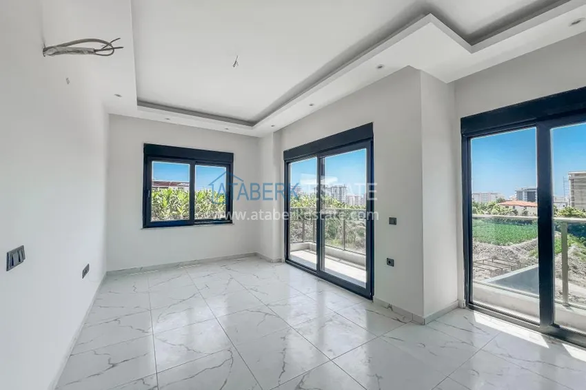 Kupuj  Gotowy apartament z jedną sypialnią w nowym kompleksie - dzielnica Mahmutlar, Alanya 2 