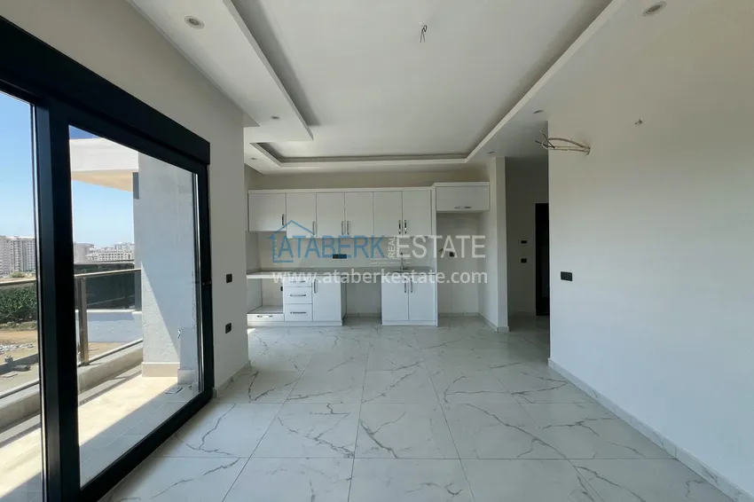 Kupuj  Gotowy apartament z jedną sypialnią w nowym kompleksie - dzielnica Mahmutlar, Alanya 3 
