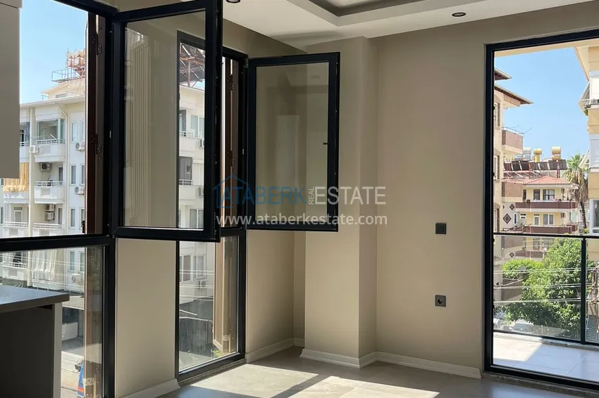 Kupuj  Apartament 1+1 w centrum Alanyi w nowym nowoczesnym kompleksie - plaża Kleopatra 4 
