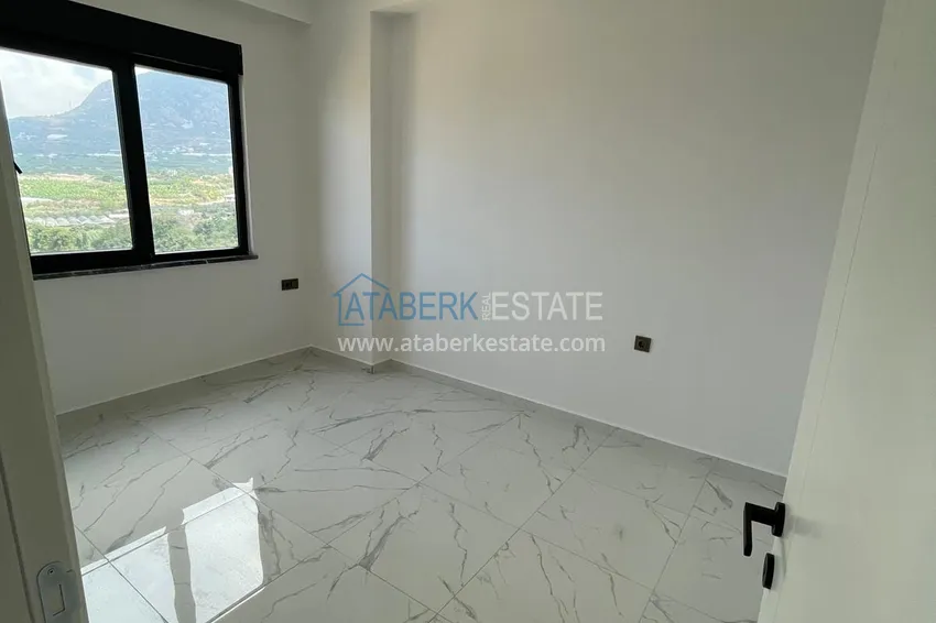 Kupuj  Nowe budynki w Alanyi! Apartament 1+1 z widokiem na góry, dzielnica Mahmutlar — Alanya 7 