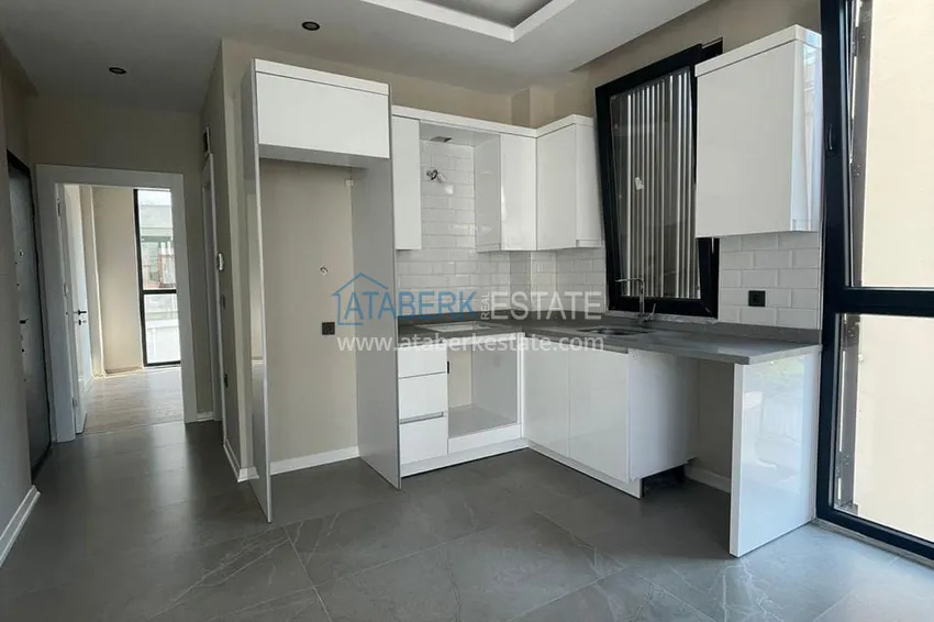 Kupuj  Apartament 1+1 w centrum Alanyi w nowym nowoczesnym kompleksie - plaża Kleopatra 9 