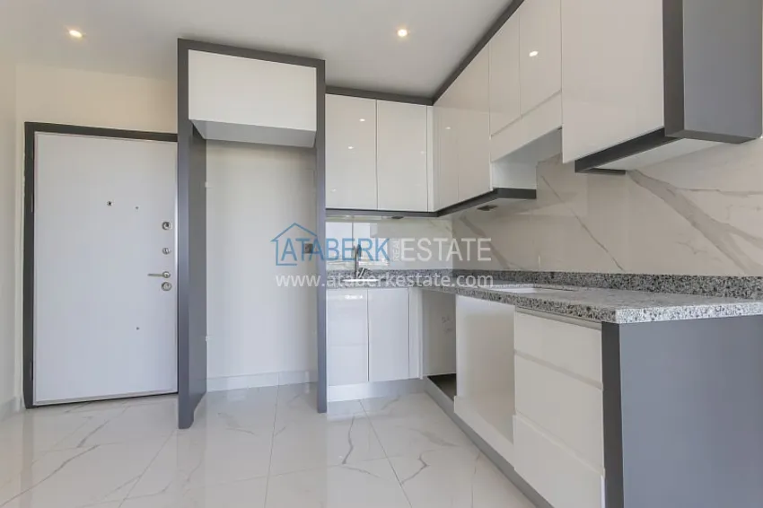Kupuj  Dobrze wykończony apartament z 1 sypialnią i widokiem na morze, dzielnica Avsallar — Alanya 11 