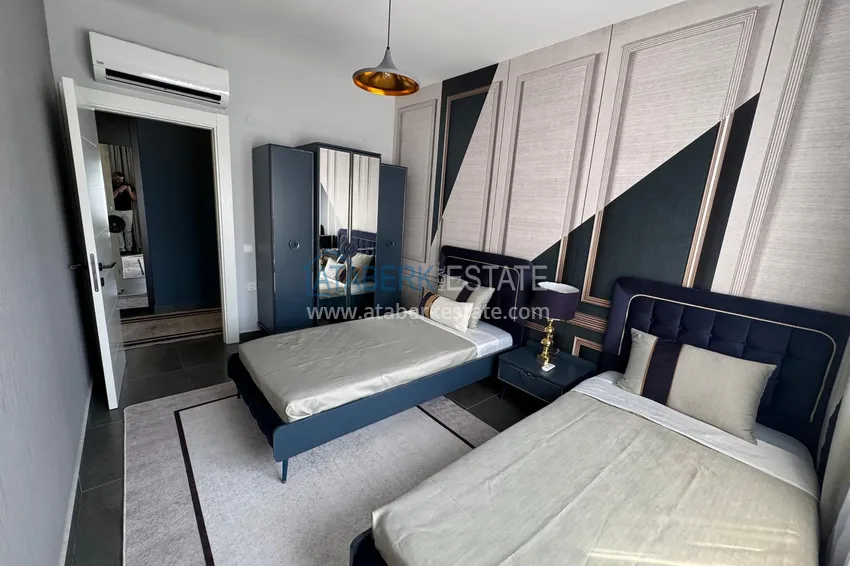 Kupuj  Apartament 2+1 z meblami i widokiem na morze w młodym kompleksie, dzielnica Mahmutlar — Alanya 14 