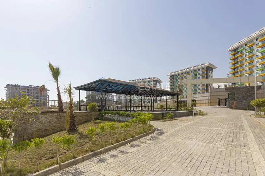Dobrze wykończony apartament z 1 sypialnią i widokiem na morze, dzielnica Avsallar — Alanya 13 