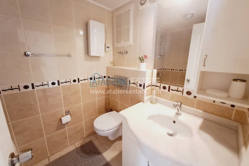 Kupuj  Umeblowany apartament z dwiema sypialniami 100 metrów od morza - dzielnica Mahmutlar, Alanya  14 
