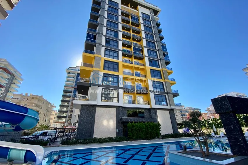 Apartament Linear 3+1 z oddzielną kuchnią, nowymi meblami i częściowym widokiem na morze - dzielnica Mahmutlar, Alanya 1 