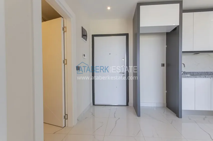 Kupuj  Dobrze wykończony apartament z 1 sypialnią i widokiem na morze, dzielnica Avsallar — Alanya 2 