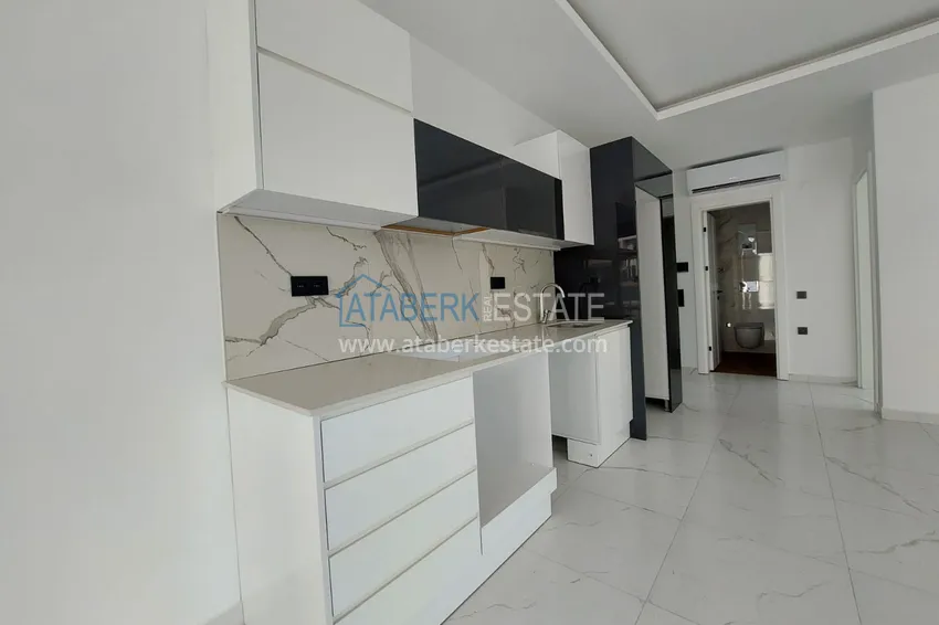 Kupuj  Jednopokojowe mieszkanie 75 m2 w centrum Alanyi w nowym kompleksie mieszkalnym  4 