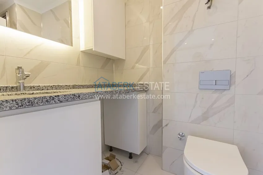 Kupuj  Dobrze wykończony apartament z 1 sypialnią i widokiem na morze, dzielnica Avsallar — Alanya 4 