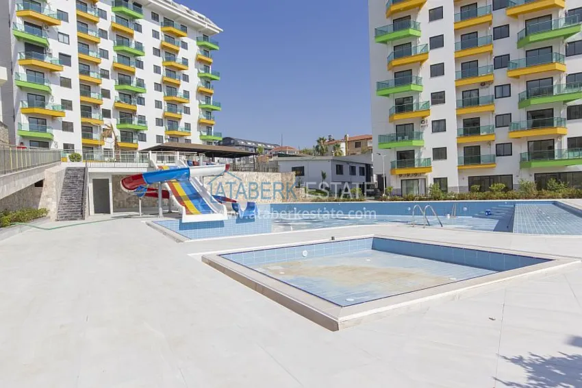 Dobrze wykończony apartament z 1 sypialnią i widokiem na morze, dzielnica Avsallar — Alanya 9 