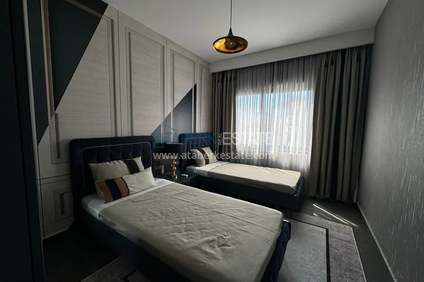 Kupuj  Apartament 2+1 z meblami i widokiem na morze w młodym kompleksie, dzielnica Mahmutlar — Alanya 12 