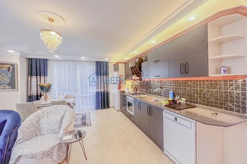 Kupuj  Apartament z dwiema sypialniami z nowymi meblami i przeszklonym balkonem w Mahmutlar 11 