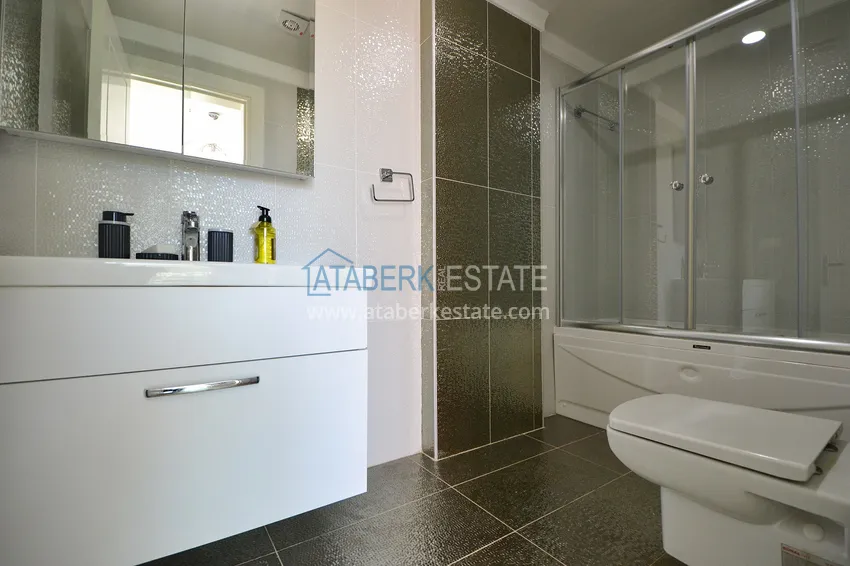 Kupuj  Umeblowany apartament z dwiema sypialniami i widokiem na morze w Kargicak, Alanya 13 