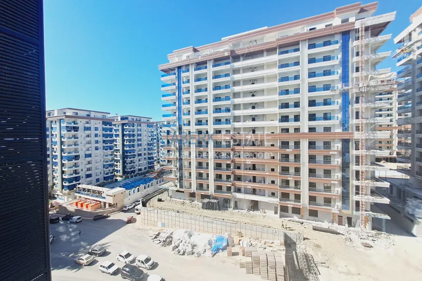 Kupuj  Apartament 1+1 z meblami i widokiem na góry w kompleksie z infrastrukturą hotelową, dzielnica Mahmutlar — Alanya  13 