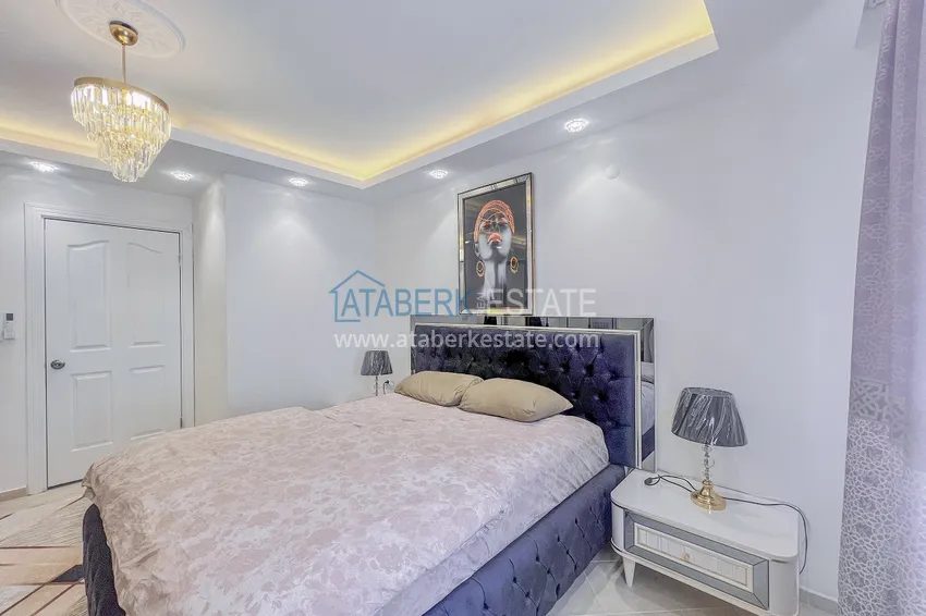 Kupuj  Apartament z dwiema sypialniami z nowymi meblami i przeszklonym balkonem w Mahmutlar 14 