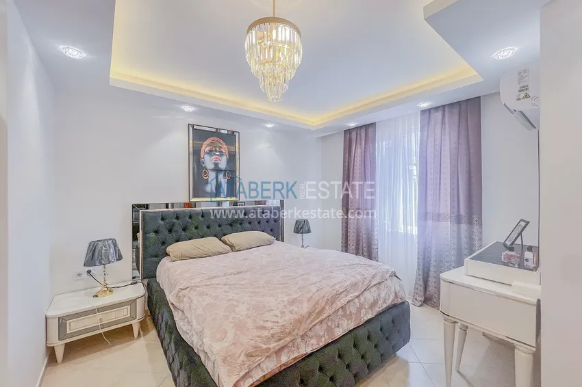Kupuj  Apartament z dwiema sypialniami z nowymi meblami i przeszklonym balkonem w Mahmutlar 16 
