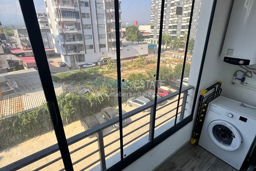 Kupuj  Dwupokojowe mieszkanie z meblami i przeszklonym balkonem w Mersin - Tomyuk 19 