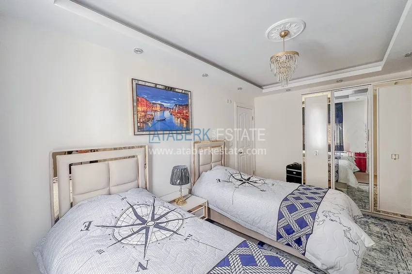 Kupuj  Apartament z dwiema sypialniami z nowymi meblami i przeszklonym balkonem w Mahmutlar 19 