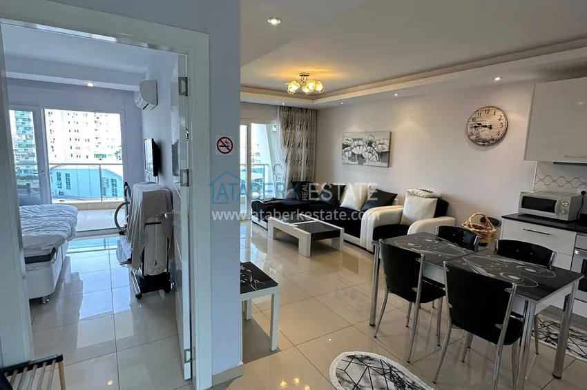 Kupuj  Nieruchomość na zezwolenie na pobyt! Apartament 1+1 z meblami i widokiem na góry, dzielnica Cikcilli — Alanya 2 