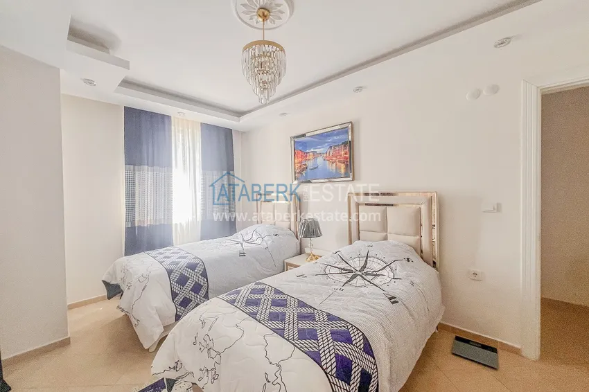 Kupuj  Apartament z dwiema sypialniami z nowymi meblami i przeszklonym balkonem w Mahmutlar 22 