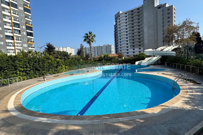 Dwupokojowe mieszkanie z meblami i przeszklonym balkonem w Mersin - Tomyuk 2 